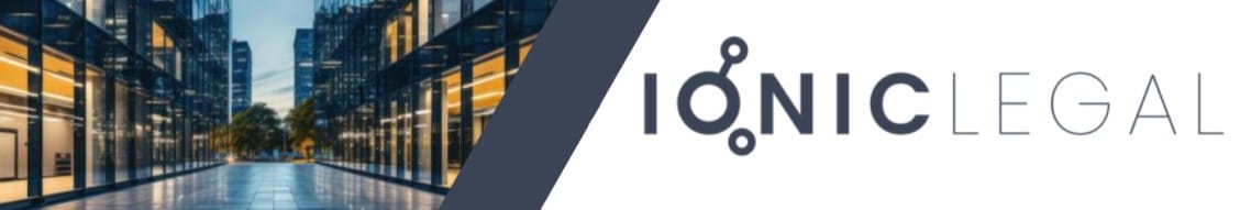 The image displays the logo of Ionic Legal. The logo features a modern design with a sleek geometric shape, combined with an image of a building, symbolizing the firm's focus on innovative and professional legal services in the commercial sector.