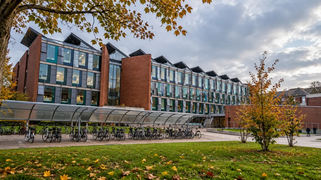 University of Sussex campus building with modern brick and glass architecture, illustrating the High Court costs ruling involving the Office for Students in October 2026.